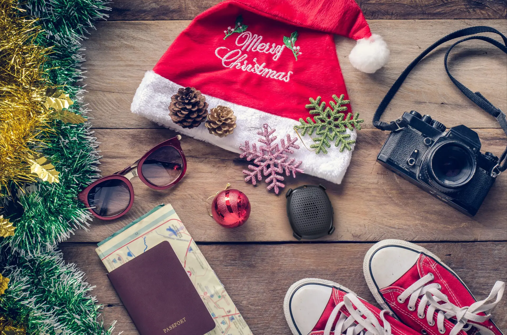 Various Christmas and holiday gifts laid out on the floor.