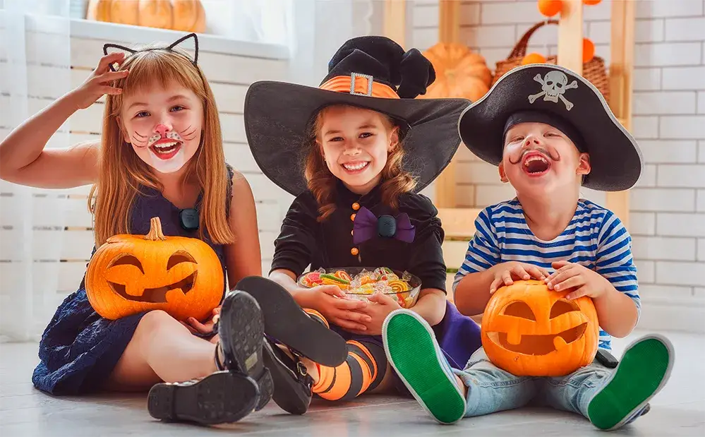 Children with Silent Beacon's on after trick-or-treating.