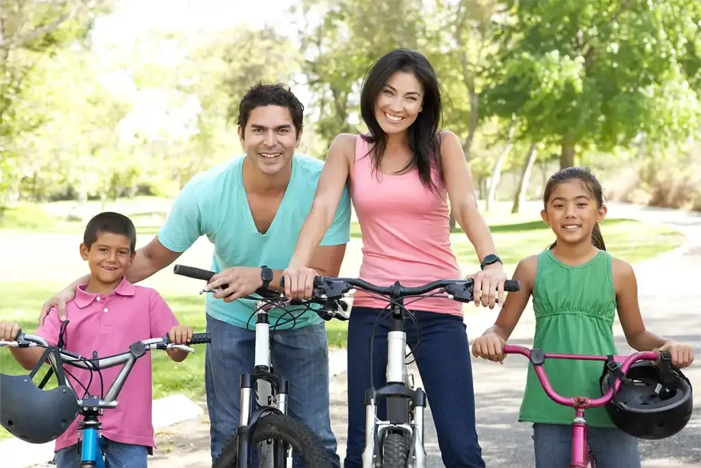 Family on bikes with safety device