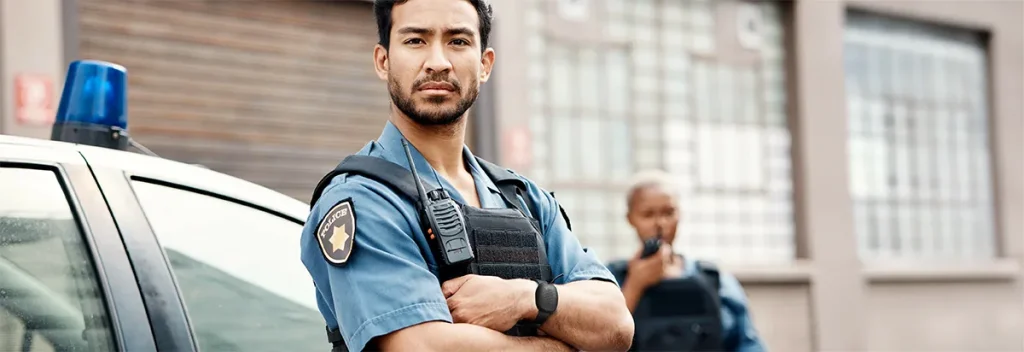 Police Officers facing camera wearing Silent Beacon