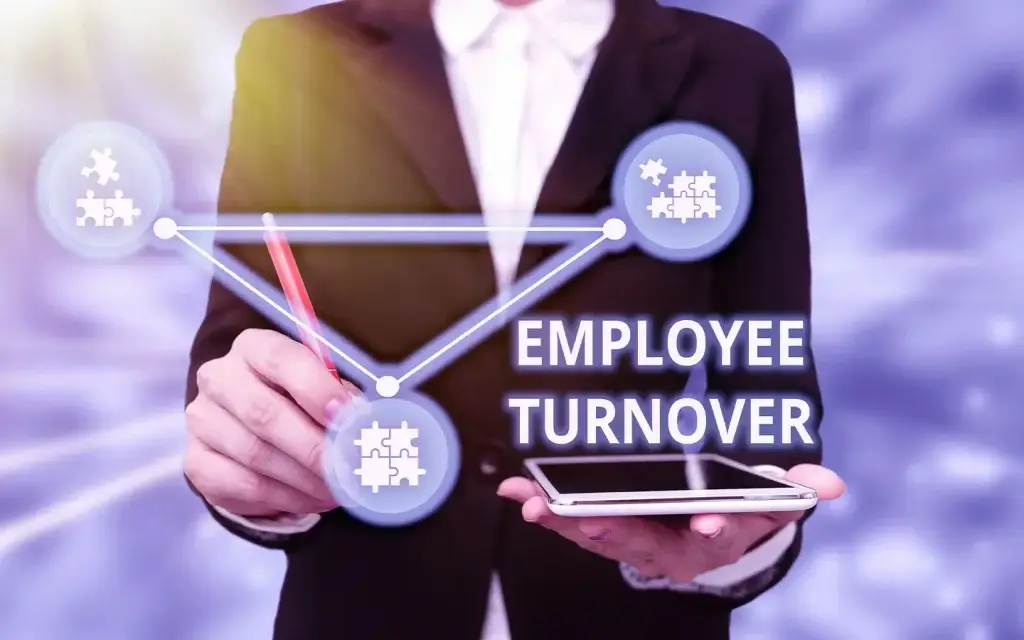 Man trying to find solution for employee Turnover Symbolized through as the bottom part of a triangle.