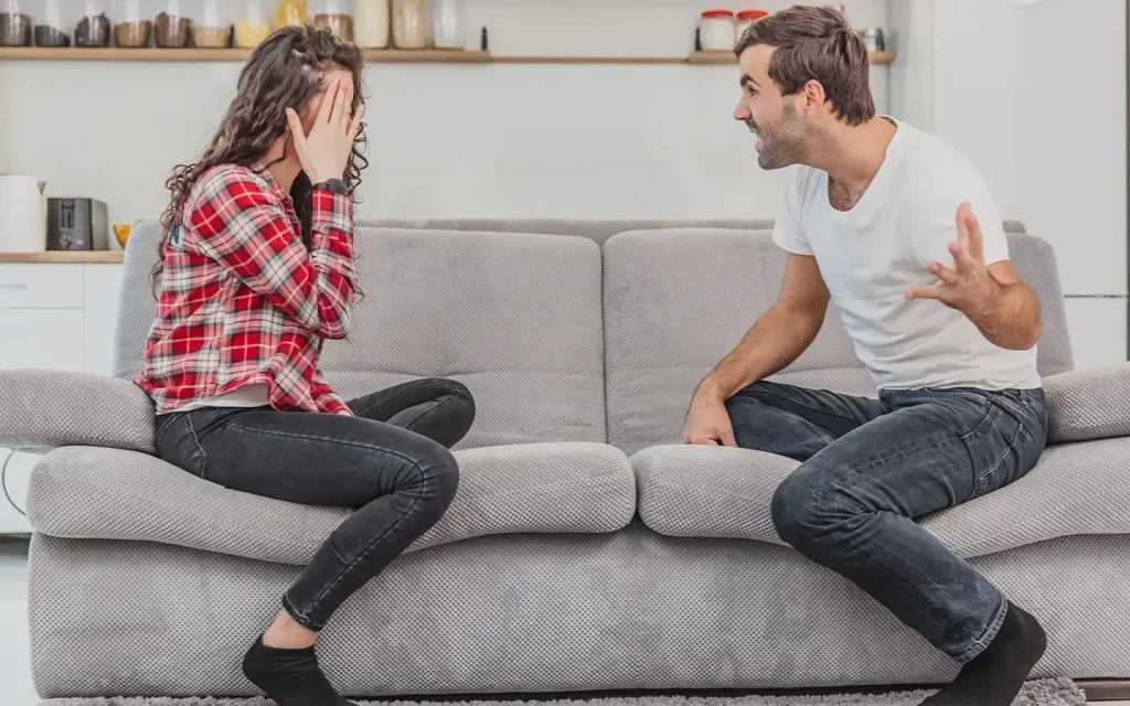 Woman wearing a Silent Beacon panic button while in a heated argument.