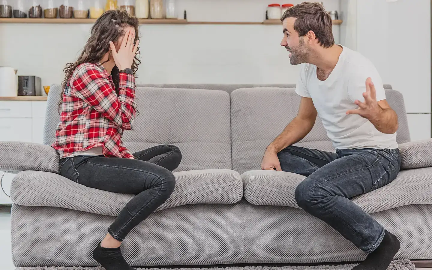 Woman wearing a Silent Beacon panic button while in a heated argument.