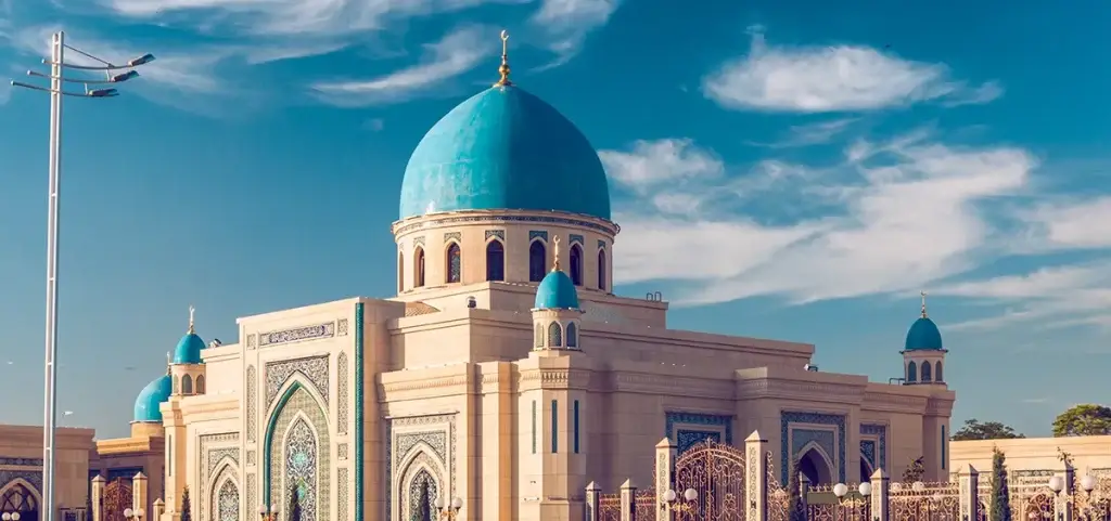 Photo of large Mosque with blue domes